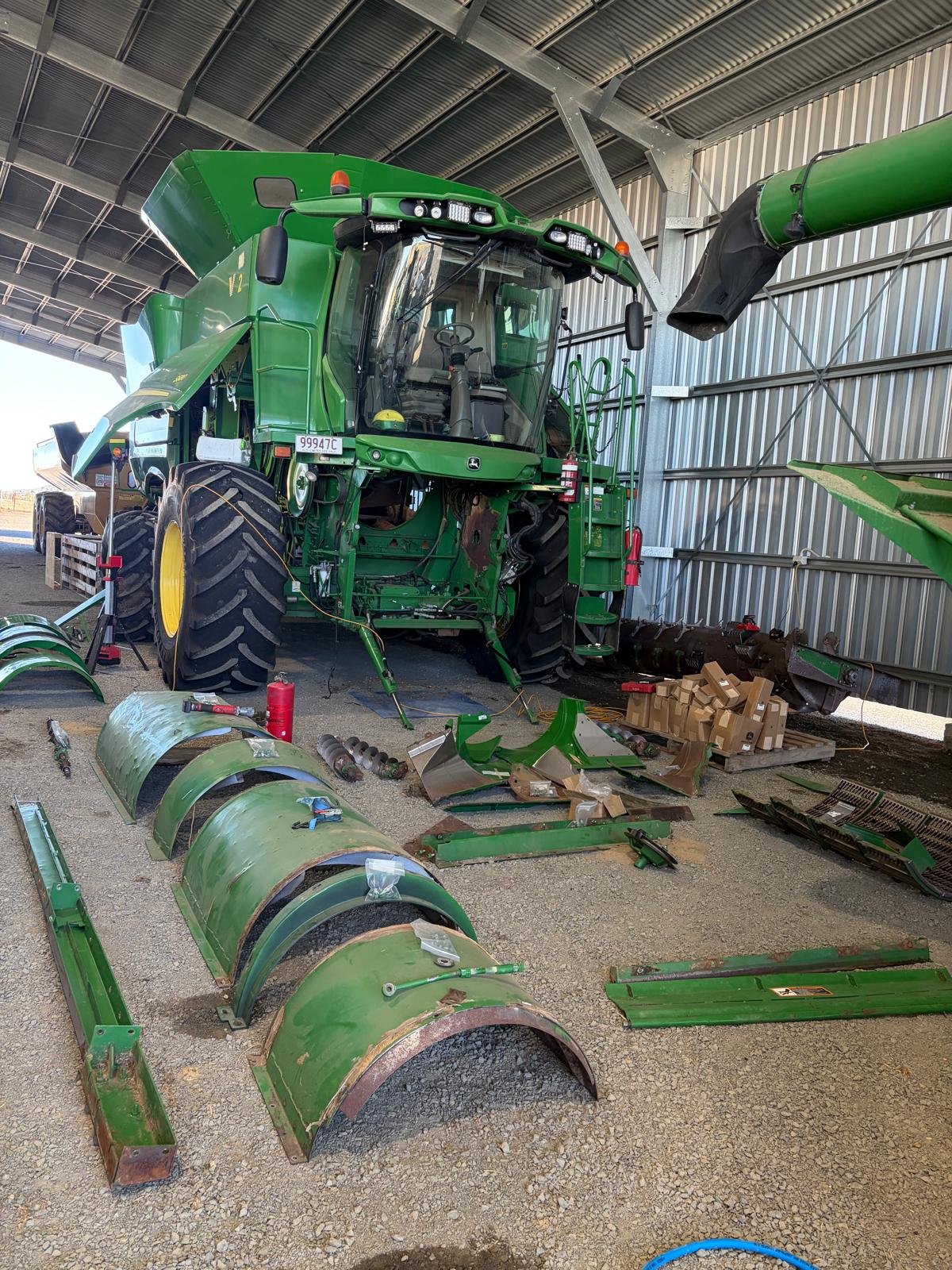 Cotton picker parked at the front of the shed