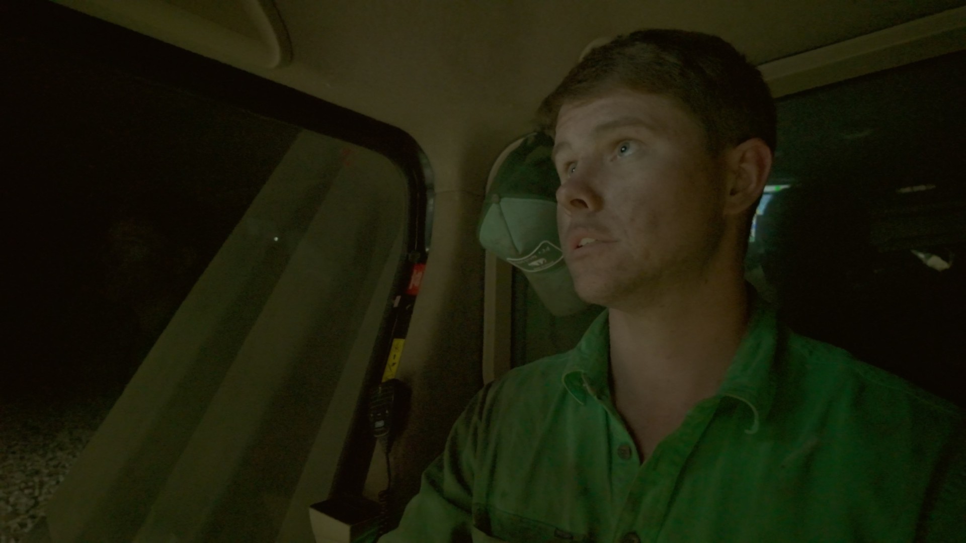 Operator in the cab during a night shift